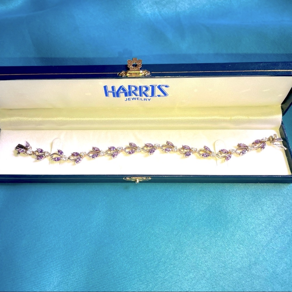 Elegant amethyst, sterling silver tennis bracelet